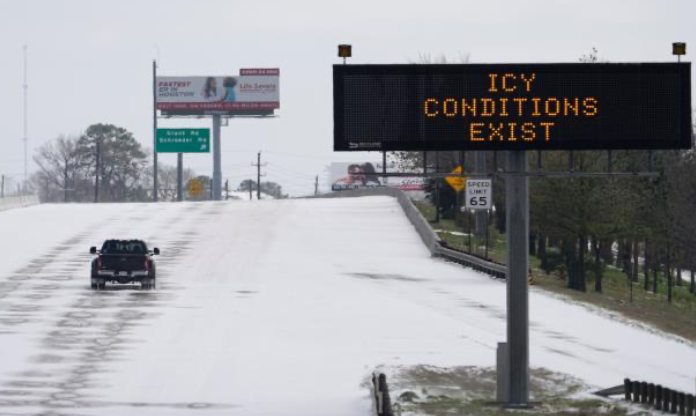 A sign to warn about road conditions