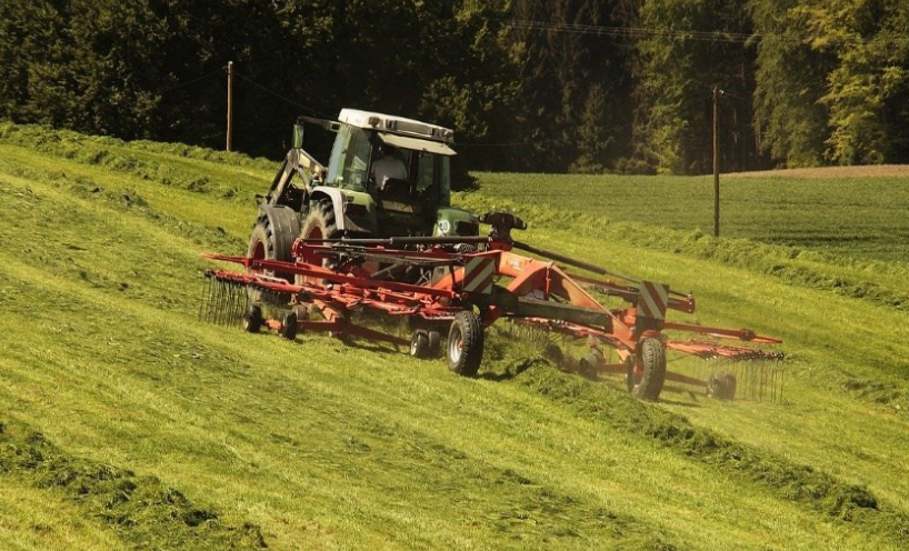 Field with Tractor – representative image