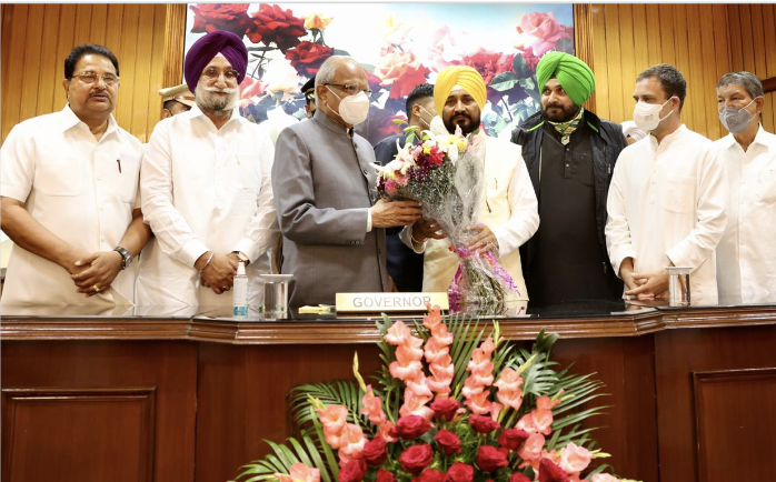 Charanjit Singh Channi with Governor Banwarilal Purohit Image Source: Twitter@INCIndia